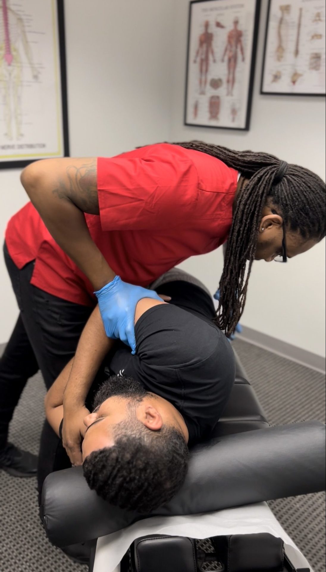 Dr. Bain adjusting spine of patient